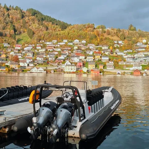 The RIB moored below the village on the Hardangerfjord