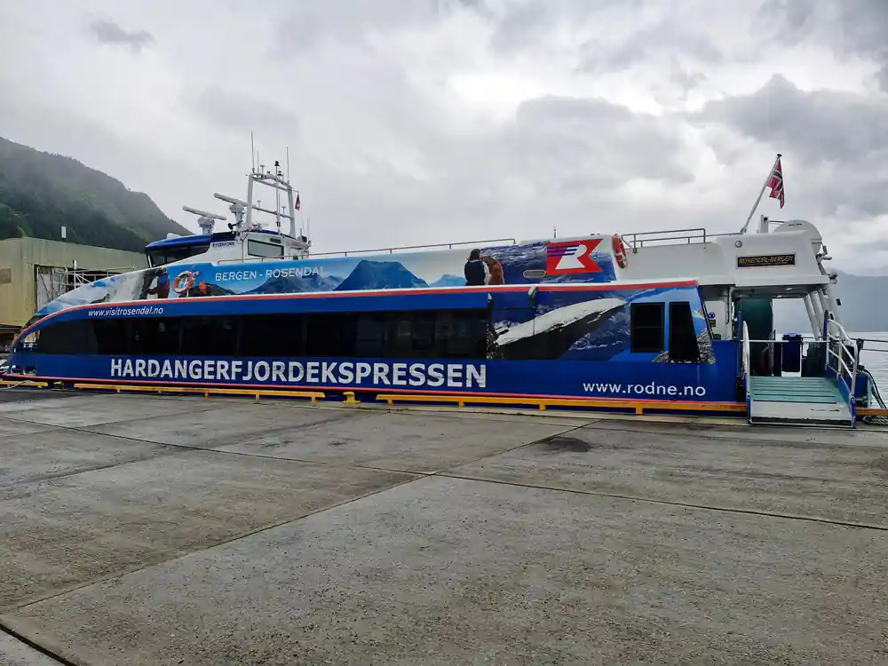 the Bergen to Rosendal catamaran on the quay, operator name on the hull