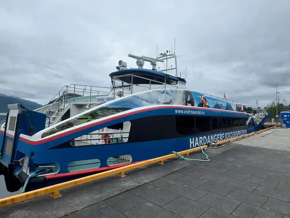 the Hardangerfjordekspressen catamaran tied alongside the quay