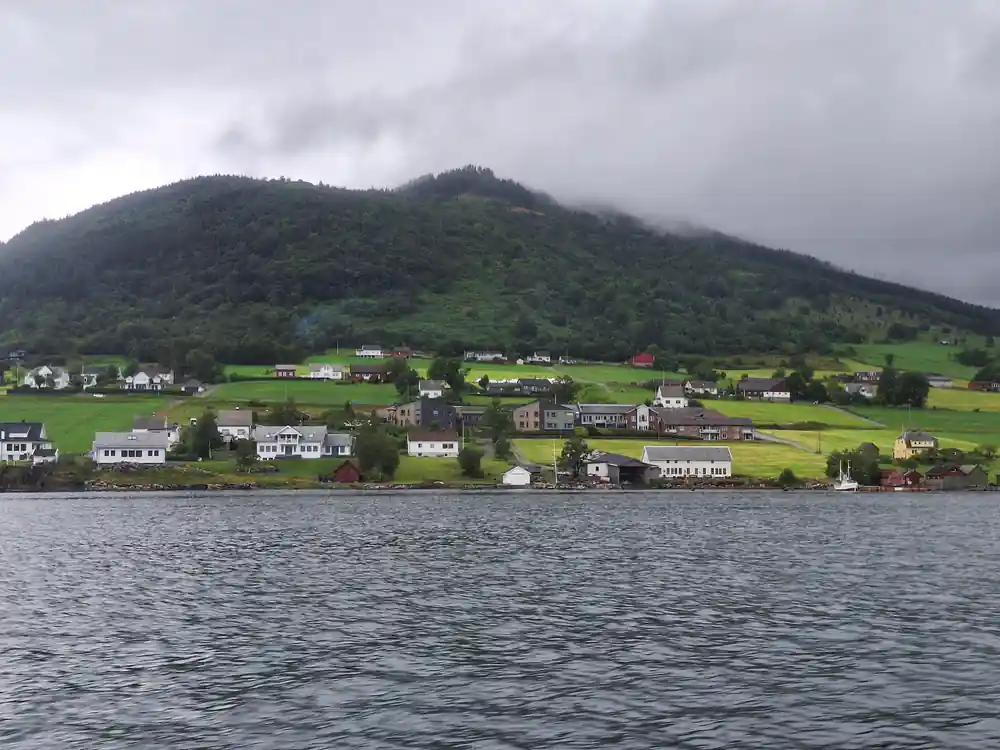 a scattered fjord-side settlement seen from the water